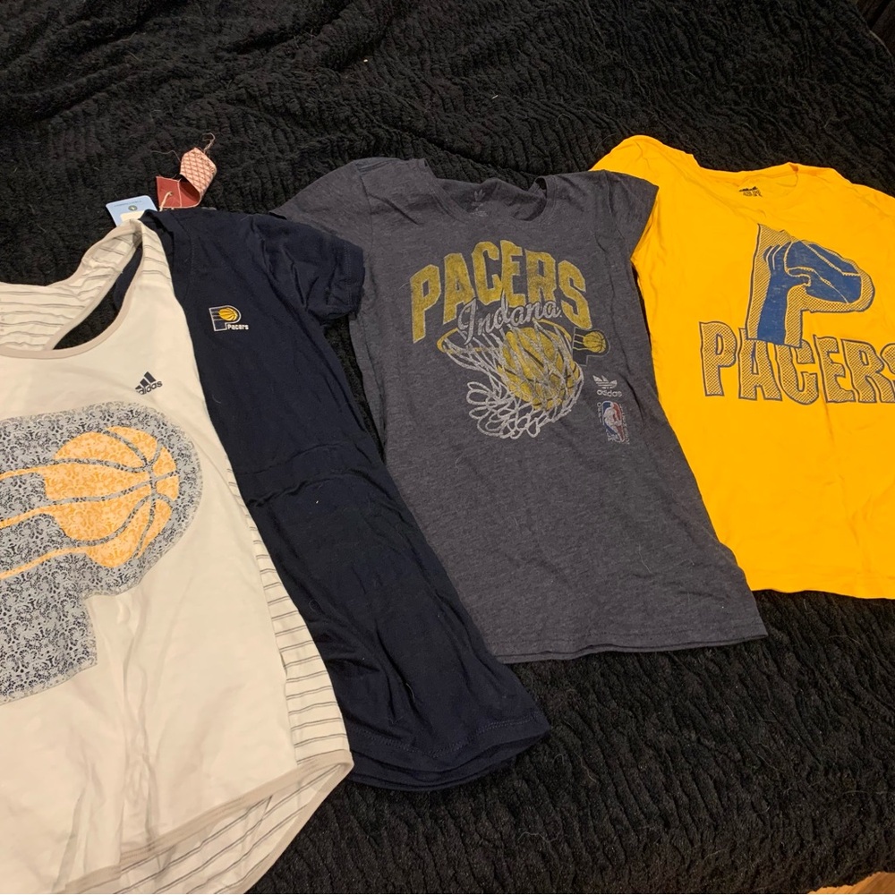 Bundle of PACERS shirts.